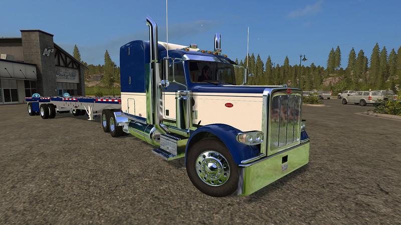 1481167210 peterbilt 388 and manic flatbed trailer